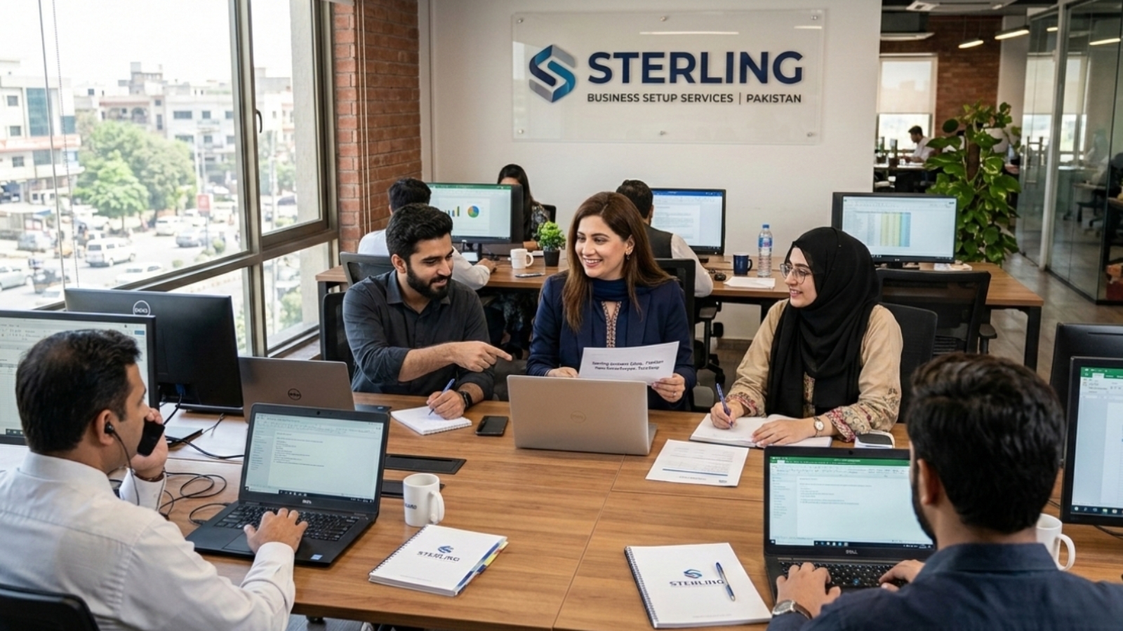 Sterling, business set up services team working in the office, Pakistan