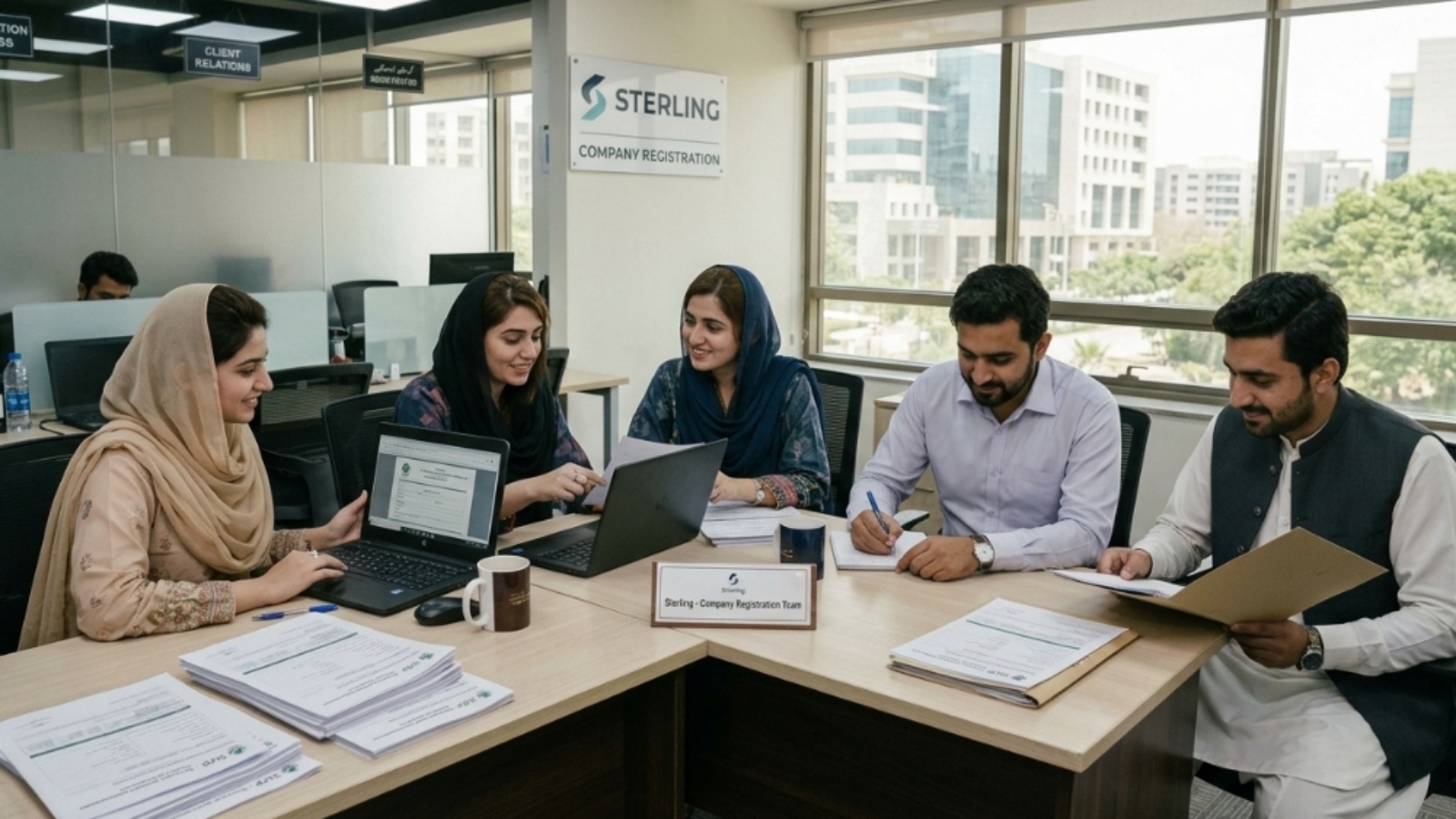 Sterling, Company Registration team working in the office, Pakistan