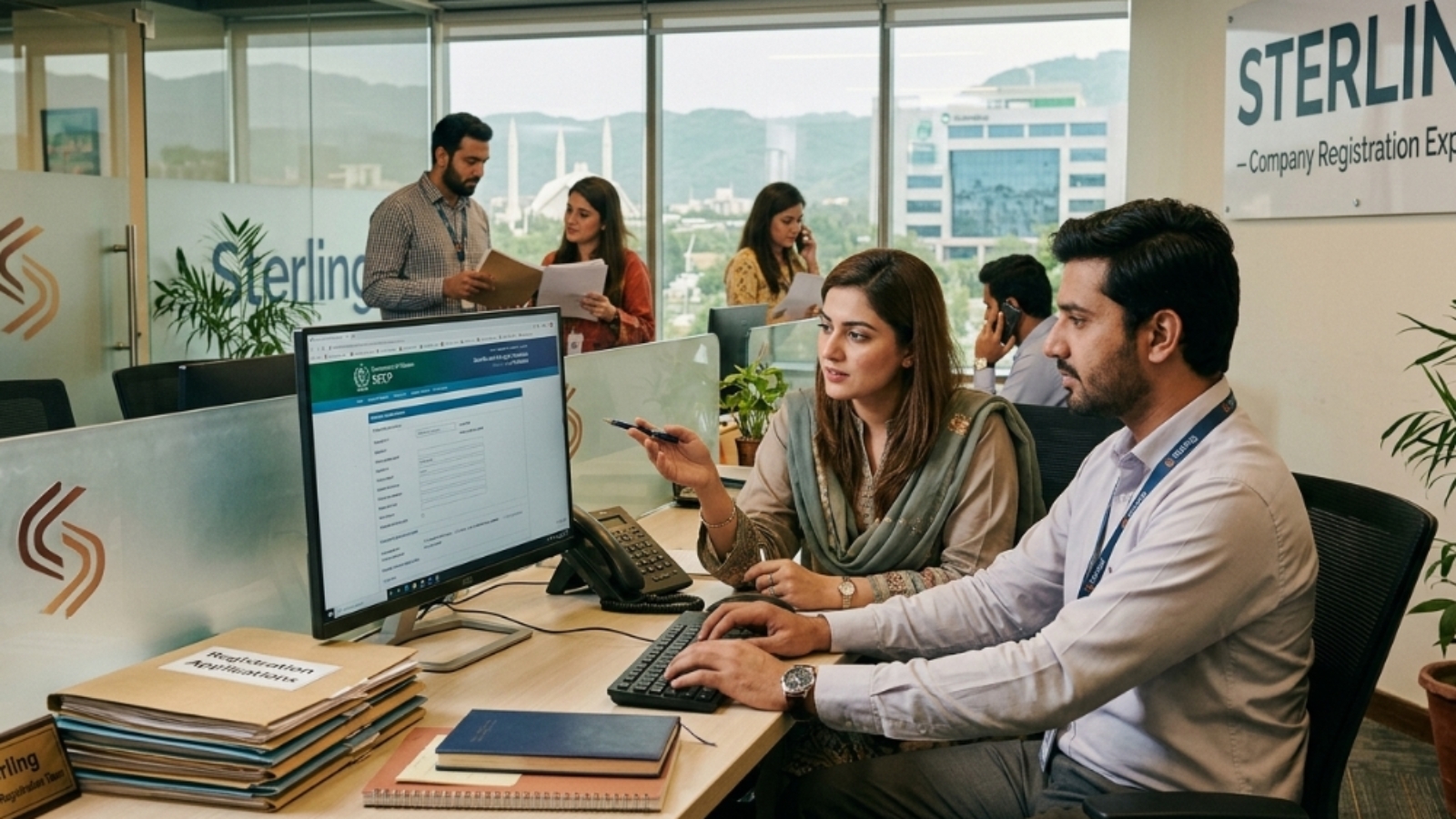Sterling, company registration team working in the office, Pakistan