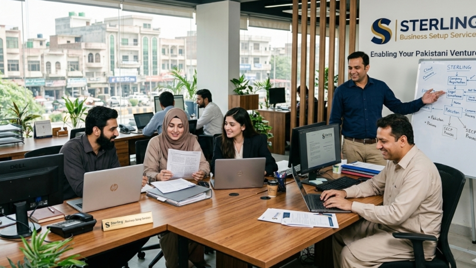 Sterling, business set up services team working in the office in Pakistan